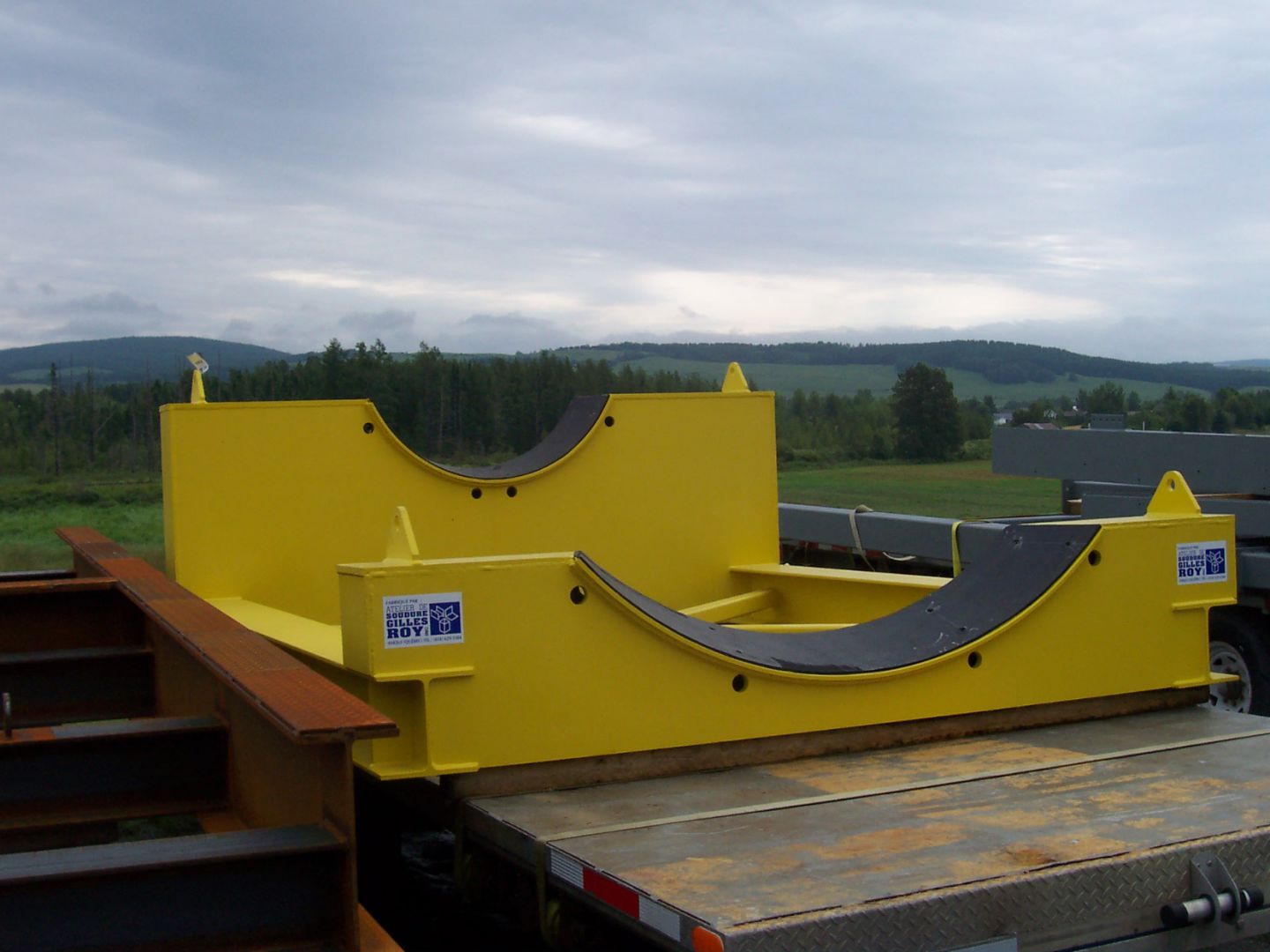 Dans le domaine minier, support pour transporter un arbre de concasseur